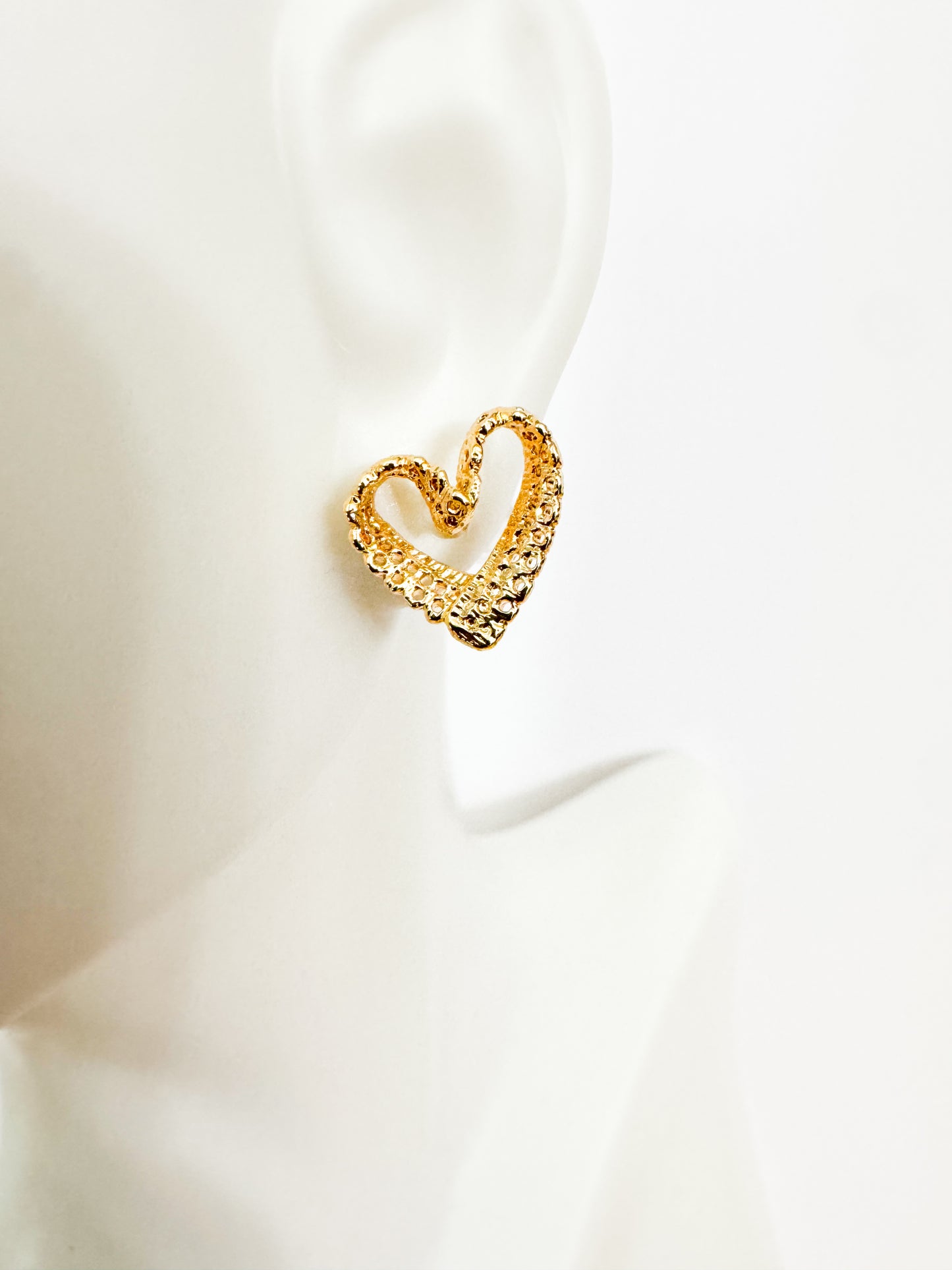 filigree heart studs in gold