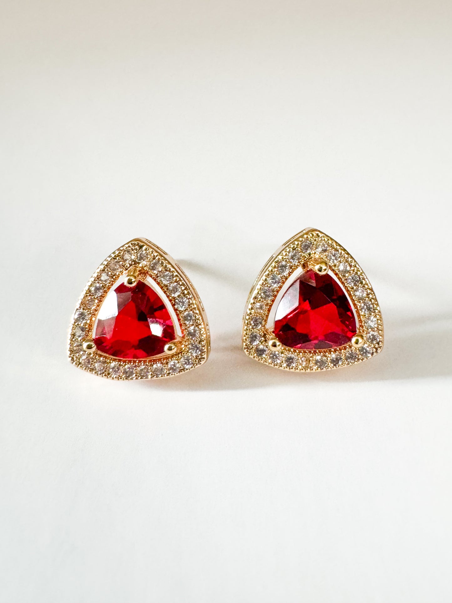 red cubic zirconia pave triangle studs