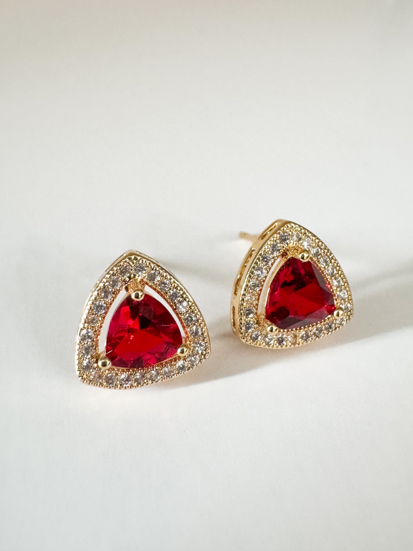 red cubic zirconia pave triangle studs