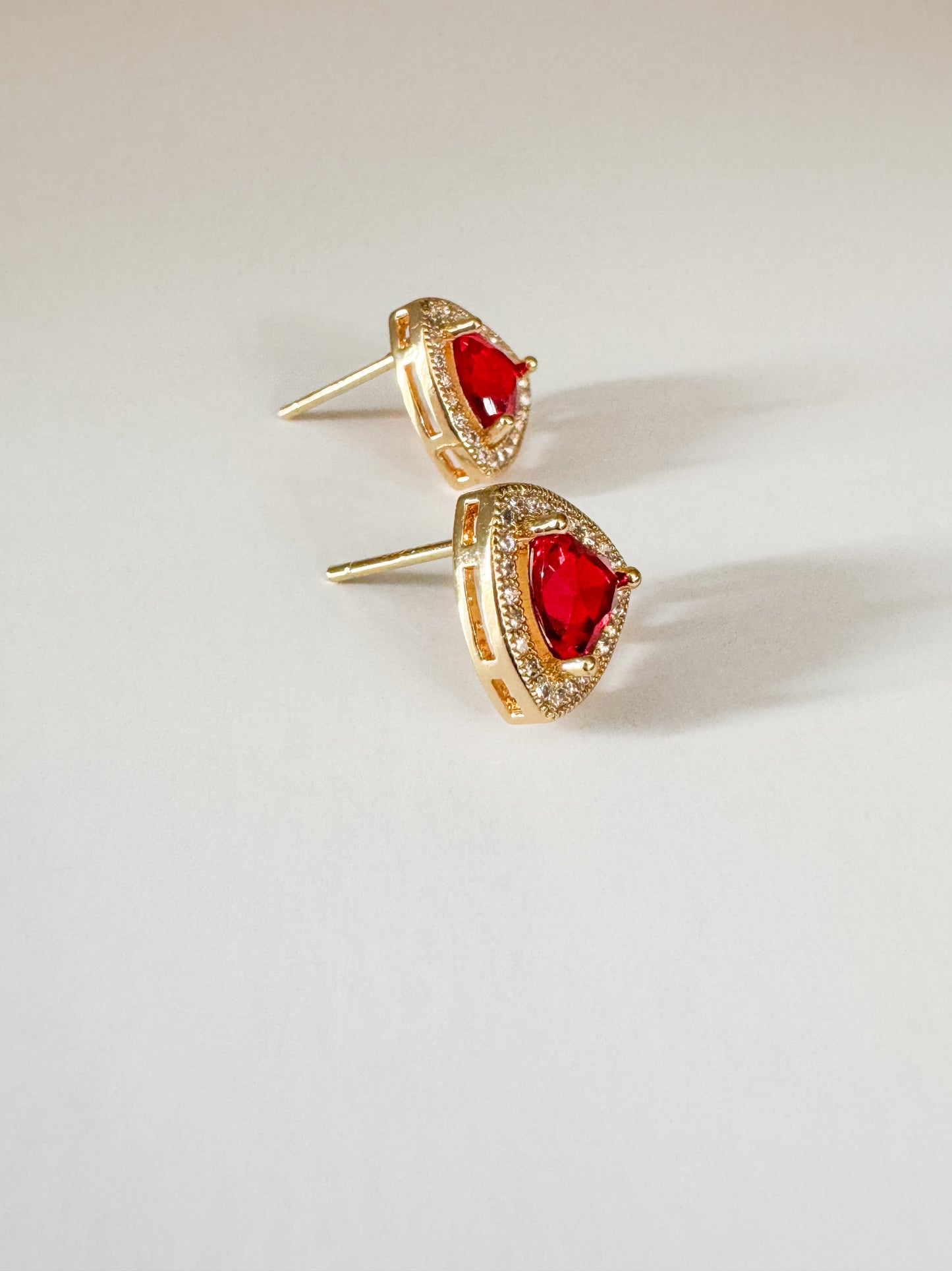 red cubic zirconia pave triangle studs