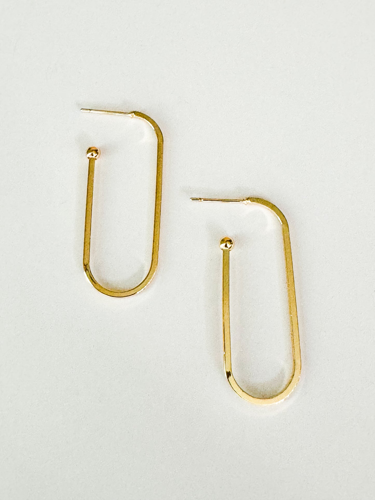 gold rounded rectangle hoop earrings
