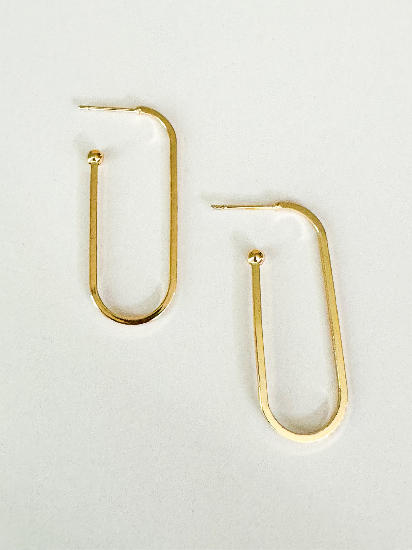 gold rounded rectangle hoop earrings