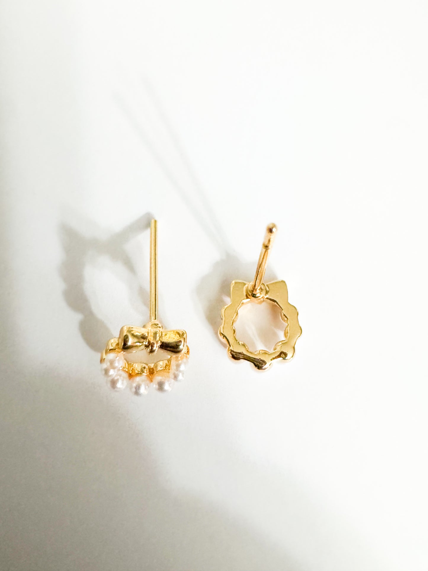 mini faux pearl with gold bow studs